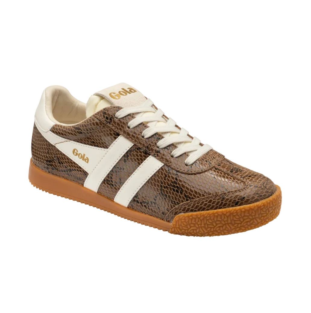 A low-top sneaker by Gola featuring a brown and black snakeskin patterned upper, cream-colored side stripes and laces, and a brown gum sole, shown against a plain white background.